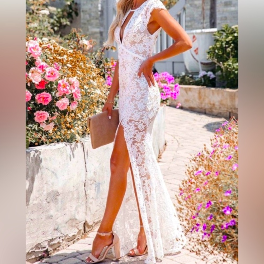 Brand New. Never Worn. Above and Beyond, plunging lace maxi dress.